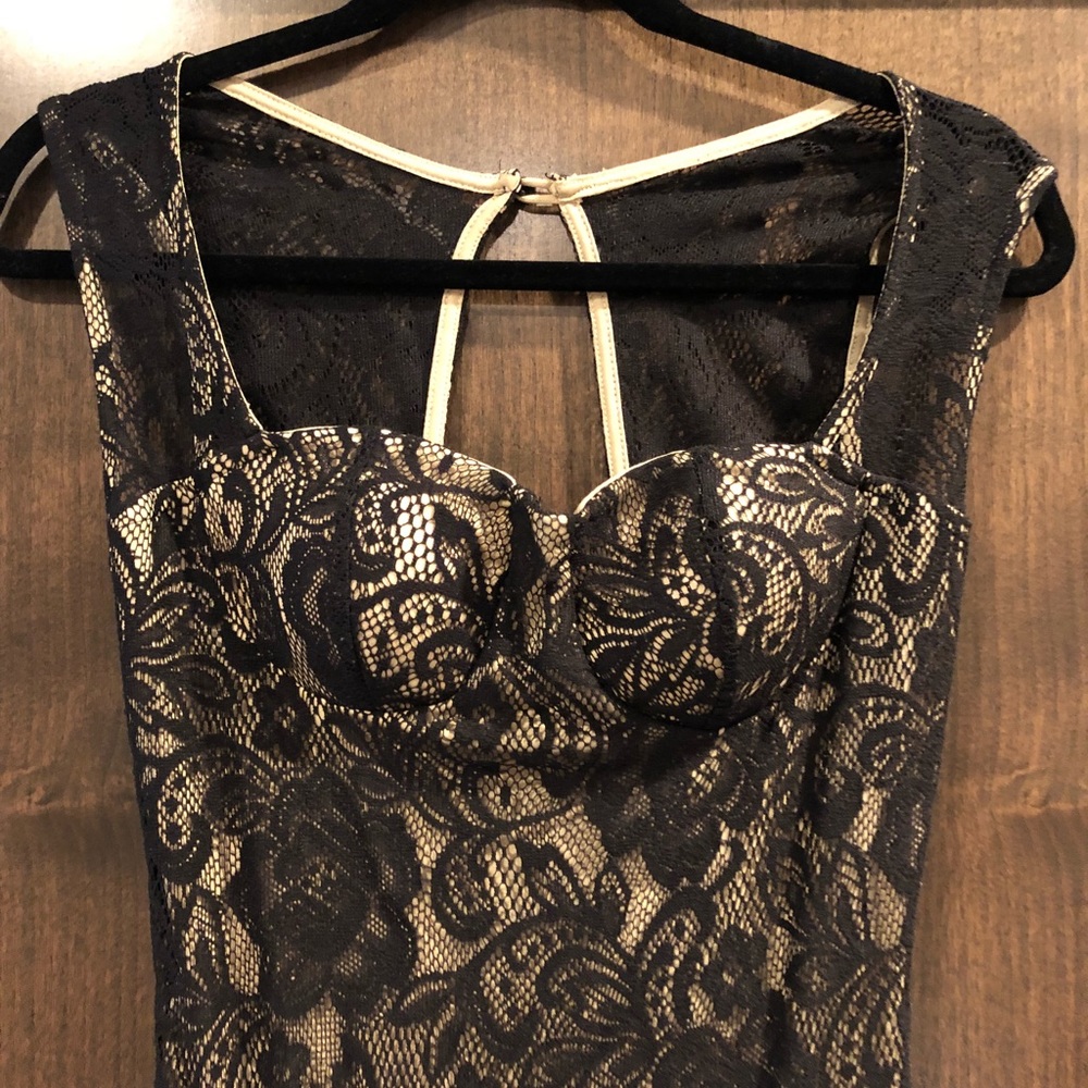 Long tan and black floral form fitting dress